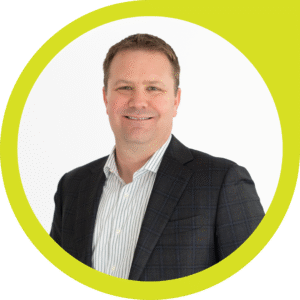 Mediator John Glowacki headshot in a green frame honoring his graduation from Pepperdine University