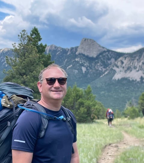 Len Gross hiking up Moreno Glacier in Patagonia